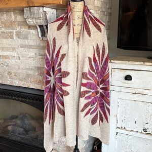 Pistil tan scarf wrap with colorful purple orange brown floral sunburst design